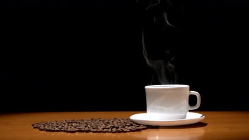 Steaming Cup of Coffee with Beans Still Life