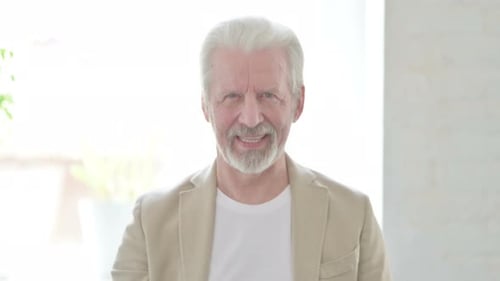 Senior Man Smiling and Laughing Portrait Close Up