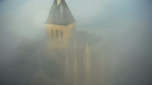 Beautiful Aerial Close-up Panning Shot of Mystic Mont Saint Michel Island Castle Fortress Under