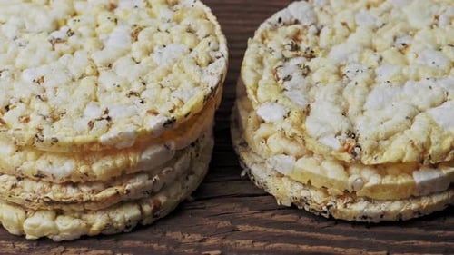 Savory Rice Cakes Stacked on Wooden Surface