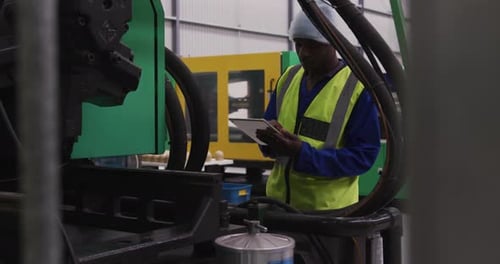 Warehouse worker using a digital tablet