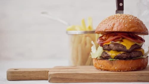 Delicious Double Cheeseburger with Fries and Soda