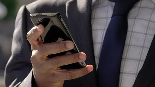 business man using smartphone