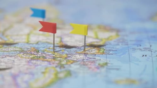 Colorful Flags Placed on a World Map