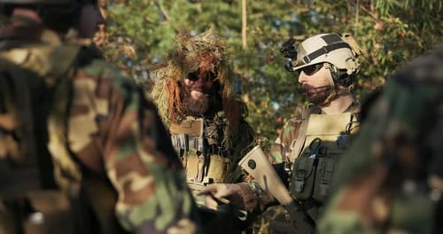 Gathering of Soldiers at Base Group of Territorial Defense Men Setting Tactics Plan of Action