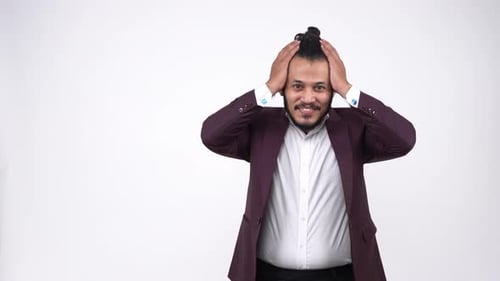 Smiling Man Wearing Blazer in Studio