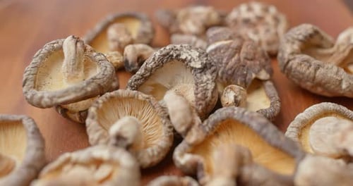 Dried Shiitake Mushrooms on a Wooden Table
