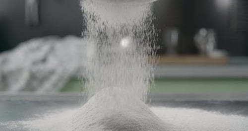 Flour Sifting Creating a Mountain of White
