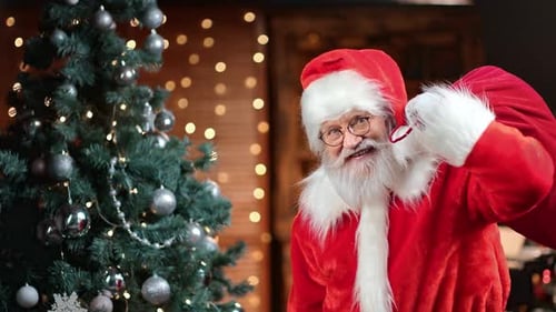 70s Grandfather in Santa Claus Costume Carrying Red Sack Full of Gifts
