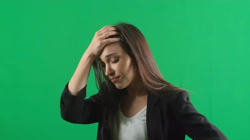 Horrible, Stress, Shock. Female Portrait Isolated at Green Screen Background. Young Emotional
