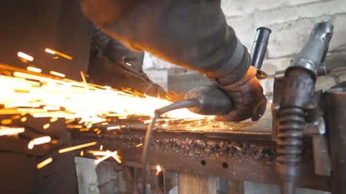 Industrial Professional Worker Use Saw Cutting Machine to Cut Metal