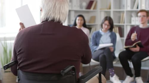 Group Therapy Session With Diverse Adults and Senior