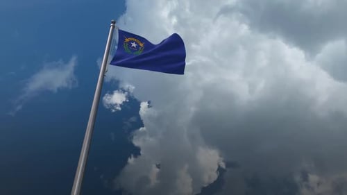 Nevada State Flag Waving with Dramatic Clouds Background