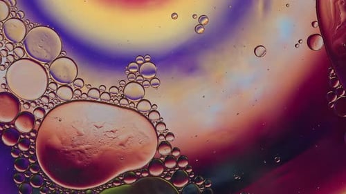 Abstract Oil Bubbles with Purple and Yellow Backdrop