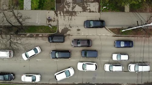 Cars Driving on City Street Birds Eye View
