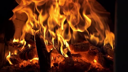 Flame fireplace burn fire warm heat. Cozy atmosphere at holiday Christmas