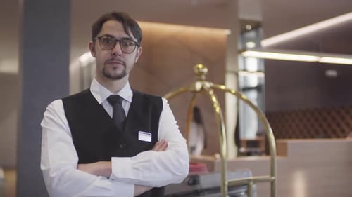 Hotel Bellhop Posing
