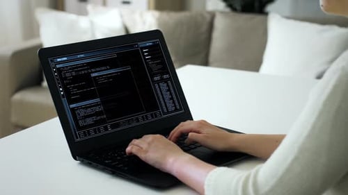Woman Working on Virtual Data on Laptop Computer 39