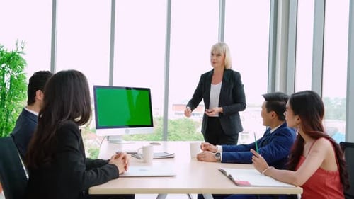 Business People in the Conference Room with Green Screen