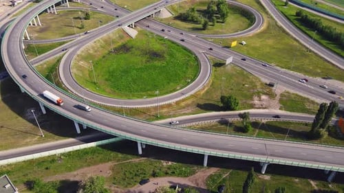 Road interchange or highway intersection with busy urban traffic