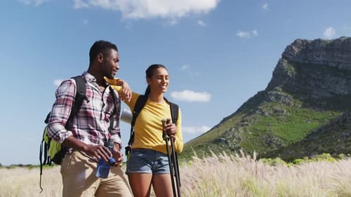 Couple Enjoying Sunny Day Hiking in Tropical Nature