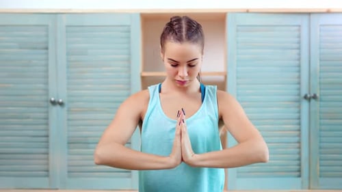 Woman Meditating in a Home Setting