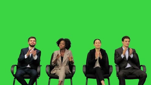 Young People Applauding to an Excellent Speech on a Green Screen Chroma Key