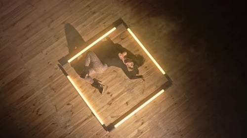 Glamorous Woman Posing in Square Light