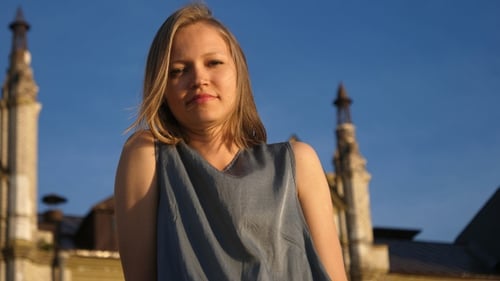 Blonde Woman Posing Elegantly Outdoors in the City
