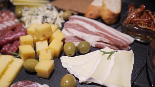 Restaurant Meat Platter (Ham, Salami, Bacon) on the Black Stone Tray