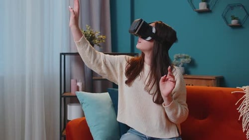 Woman Experiencing Virtual Reality with Headset at Home