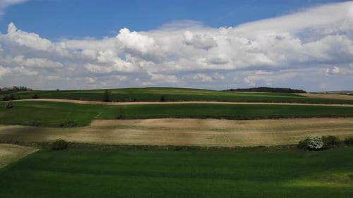 Rolling Green Farmland and Fields Aerial View