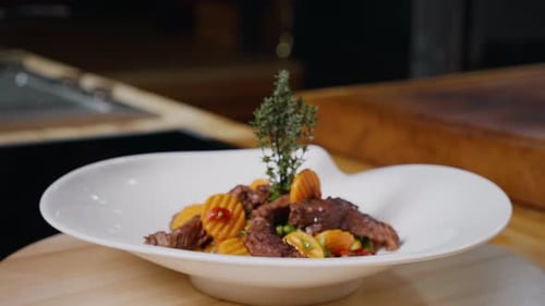 Sliced Meat and Vegetables on Decorative Plate