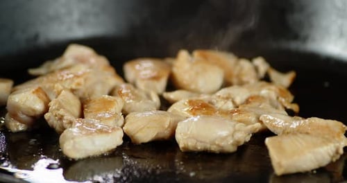 Close Up of Sizzling Meat Cooking