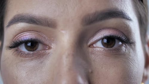 Woman's Eyes with Pink Eyeshadow Close Up