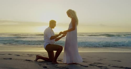 Romantic Beach Proposal at Sunrise