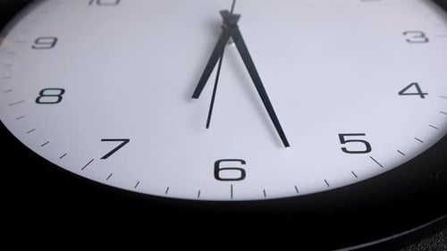 Office Clocks on Yellow Background