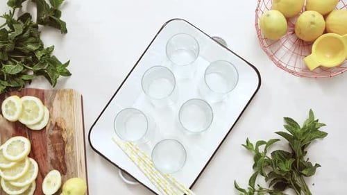 Preparing Refreshing Lemon and Mint Infused Water