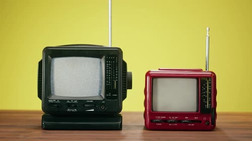 Retro Televisions Showing Static on Screens