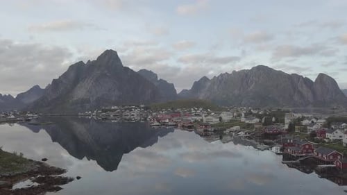 Picturesque view of town by high rocks