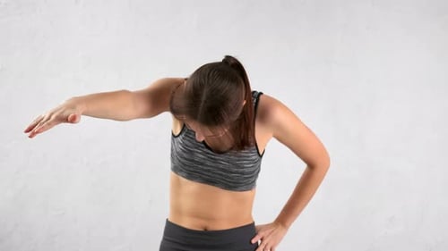 Woman Doing Torso Stretches for Fitness and Health