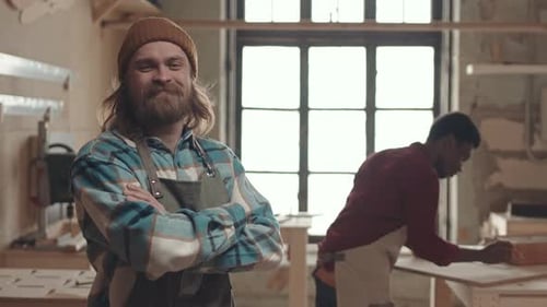 Portrait of Caucasian Craftsman in Workshop