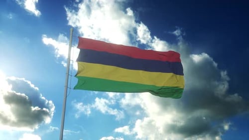 Flag of Mauritius Waving Against a Bright Blue Sky