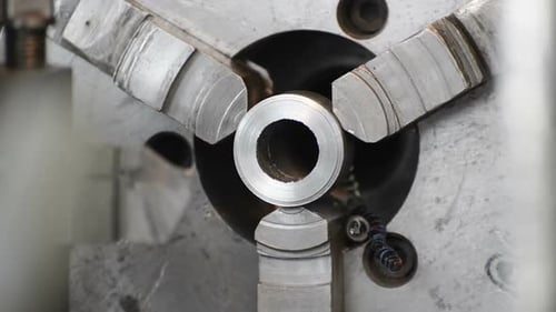 Extraction of the Manufactured Part From the Lathe Chuck