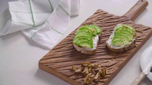 Avocado Toast on a Wood Cutting Board