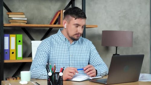 Businessman work online tells listen employees videocall webcam laptop at office