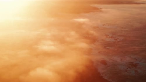 Orange Coastline During Sunrise Aerial View