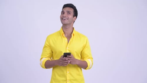 Man Using Smartphone to Have an Idea