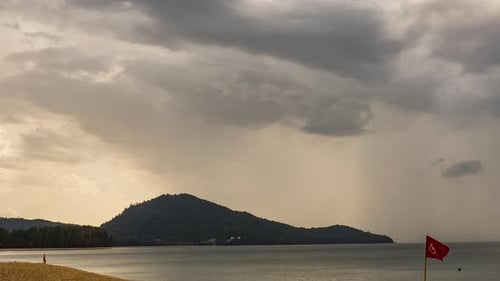 Beach Landscape With Rain and Golden Sunlight