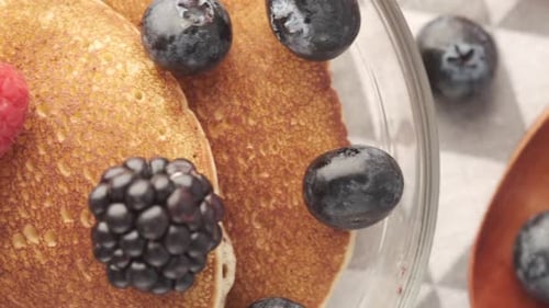 Close Up of Fresh Blue Berry and Pan Cake on Table